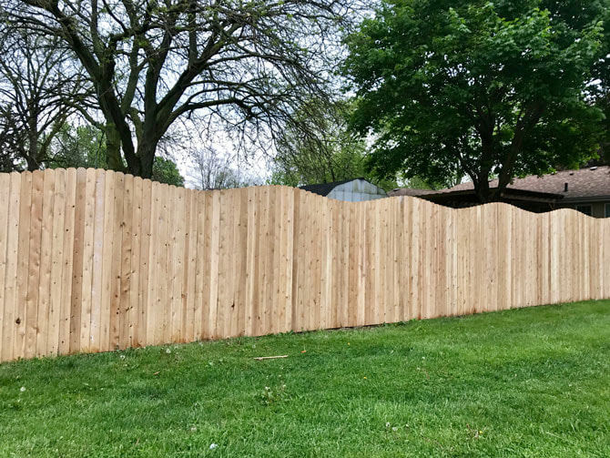 Wood fence installation in Batavia, Illinois
